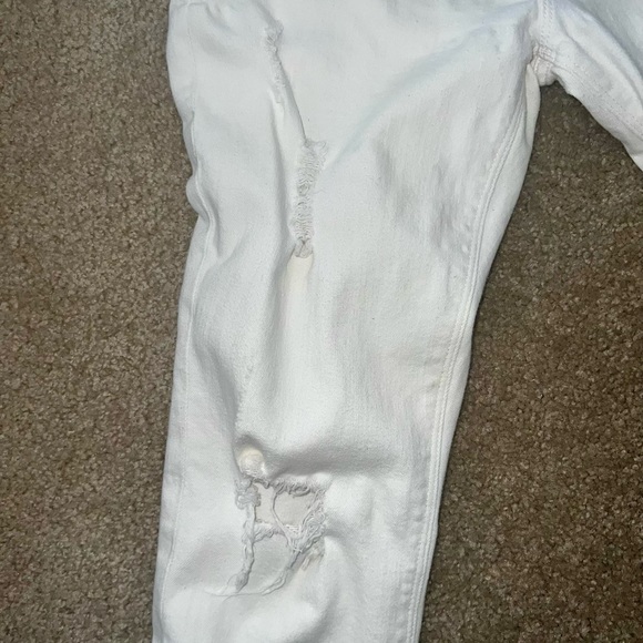 Express Mid Rise White Distressed Stretch Skinny Jeans (has color discoloration) - Picture 4 of 9